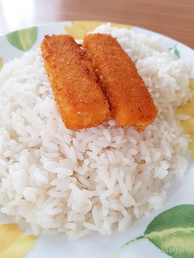 Fish finger, fried rice and drums of he...