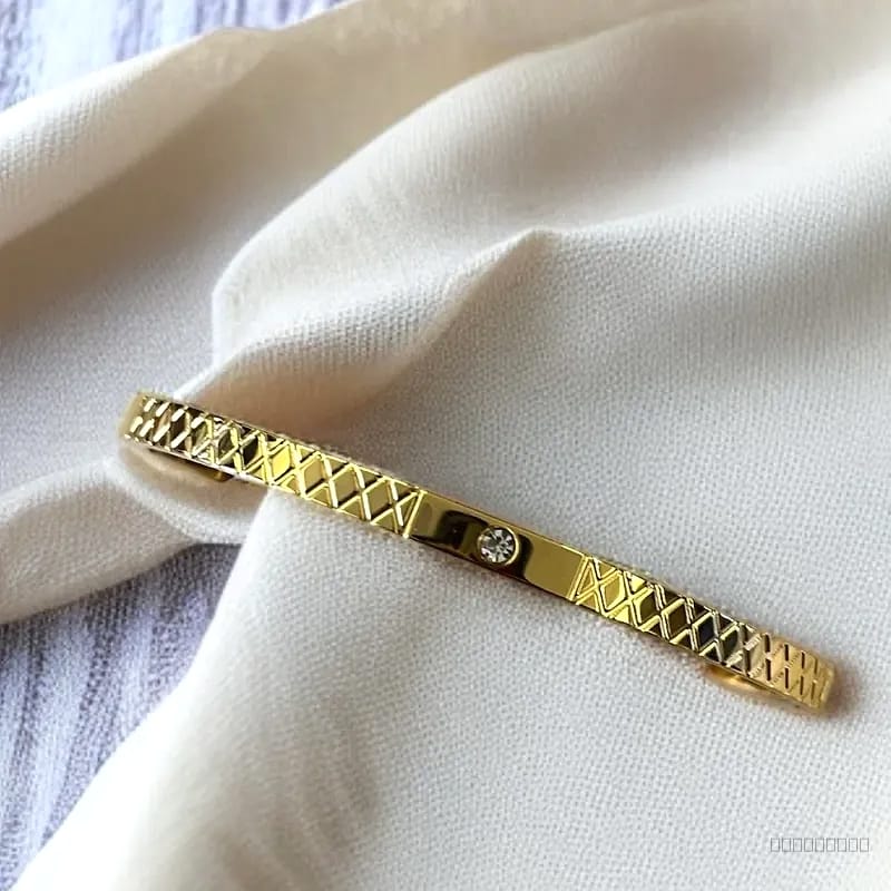 AD sleek gold cuff bracelet